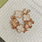 Glückliches 5-Motiv Kleeblattarmband - Natur Perlmutt