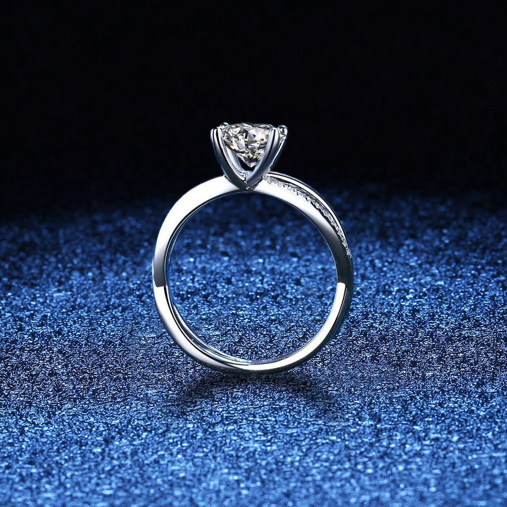 Elegant 4-Prong Crossover Moissanite Engagement Ring