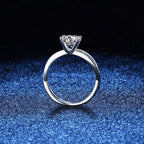 Elegant 4-Prong Crossover Moissanite Engagement Ring