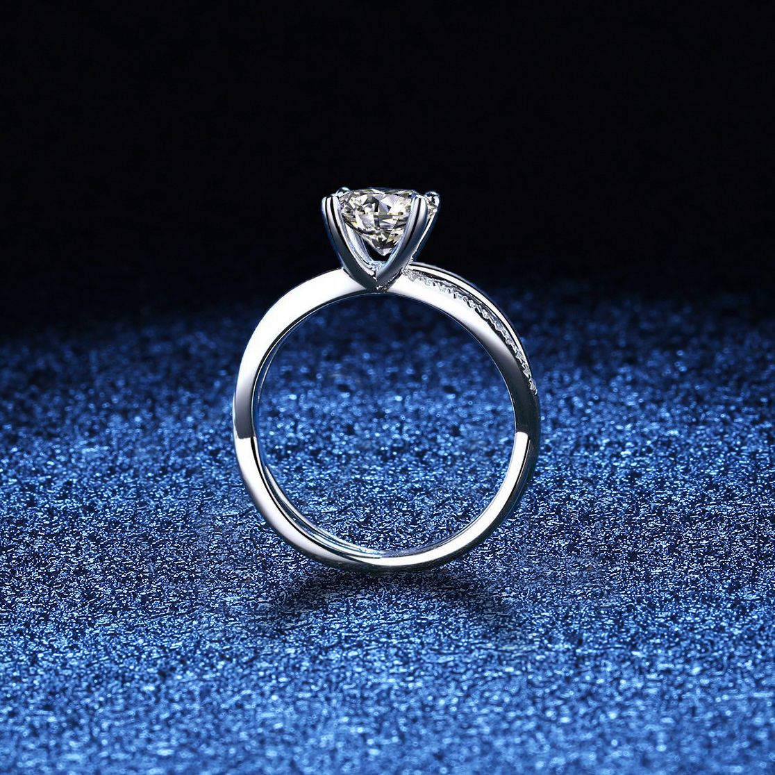Elegant 4-Prong Crossover Moissanite Engagement Ring