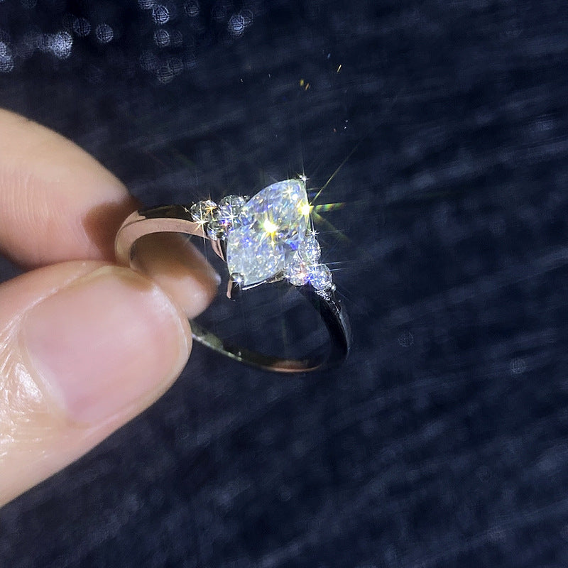 Elegant Marquise Cut Moissanite Ring with Side Accents