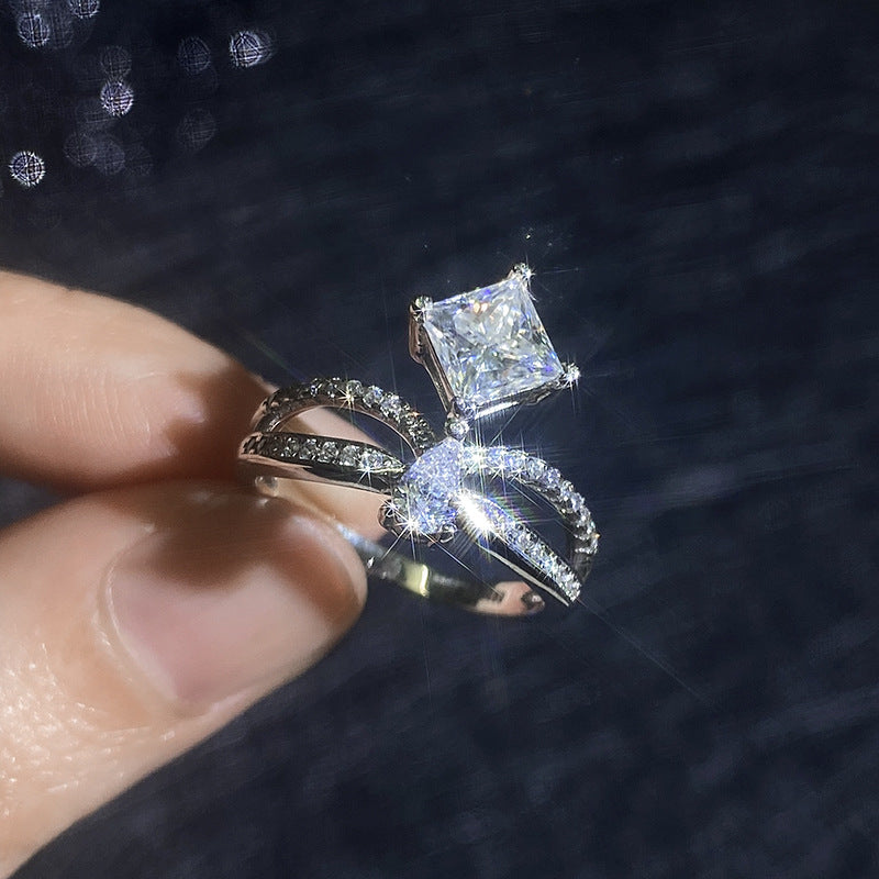 Elegant Double-Twisted Moissanite Ring